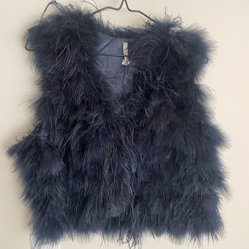 Dark blue feathered vest